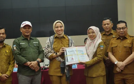 Pemkab Dharmasraya Sosialisasikan dan Serahkan DHKP serta SPPT PBB-P2 2026