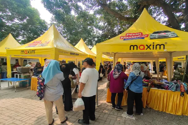 Maxim Salurkan 28 Tenda dan Gelar Pelatihan Digital untuk UMKM di Festival Kuliner Banjar 2026