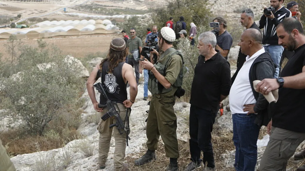 Pemukim ilegal Yahudi di Tepi Barat yang keberadaannya didukung oleh militer Israel.
