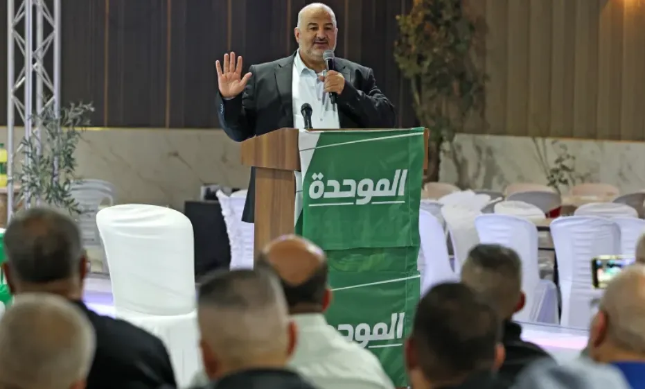 Mansour Abbas, kepala partai Islam konservatif Ra'am Israel, berbicara di sebuah rapat kampanye di desa Arab-Israel Abu Gosh, Rabu.